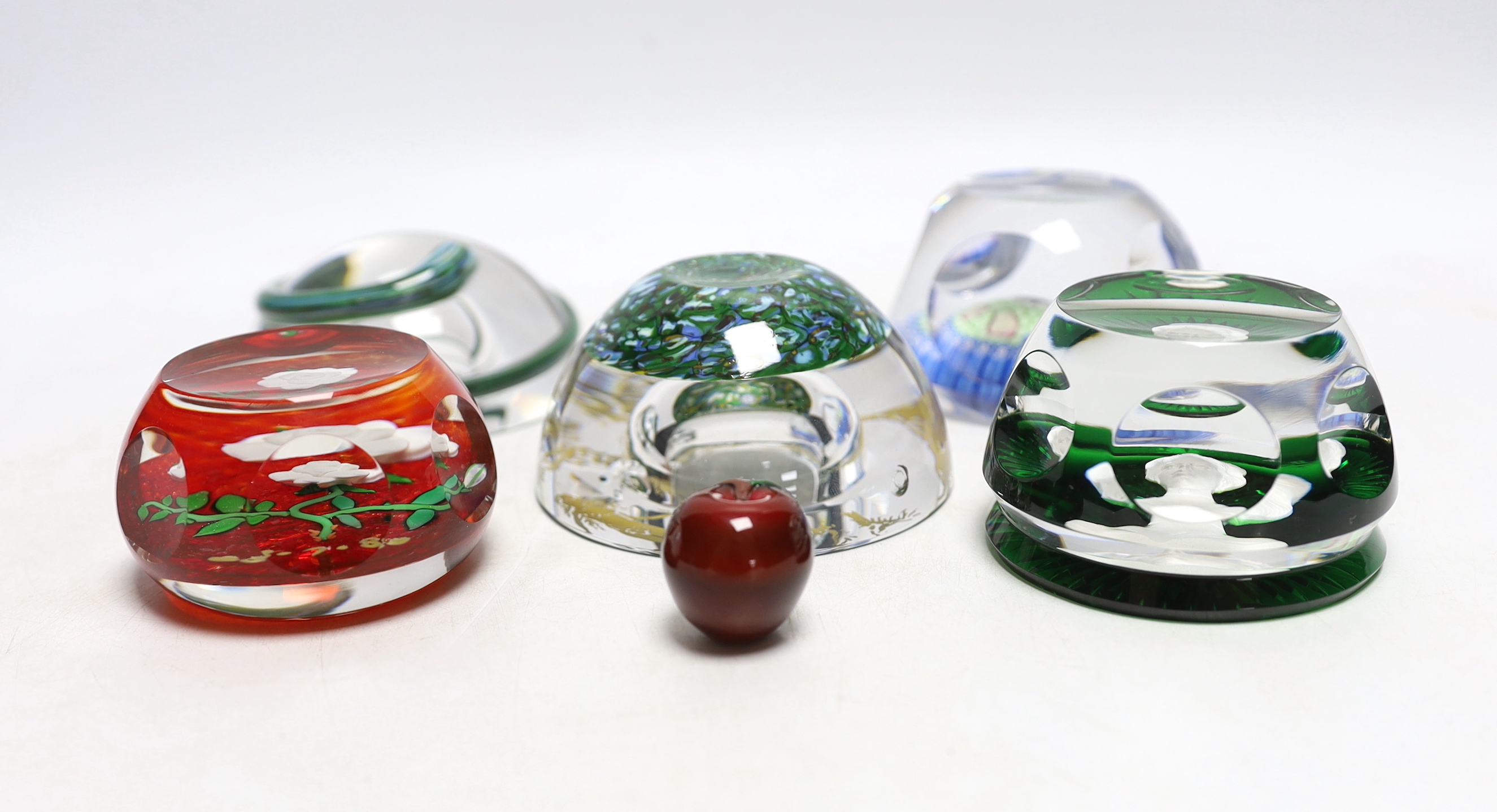 Four boxed paperweights including St Louis Adam & Eve, Baccarat sulphide, Perthshire etc.